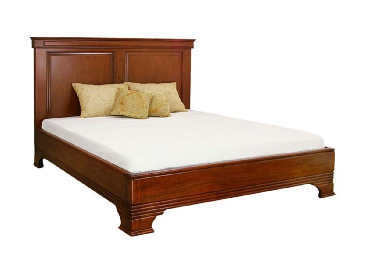 Solid wood bed with a panelled headboard and moulded footboard